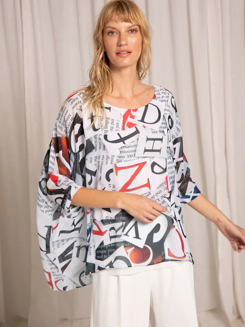 Capri Poncho in NonFiction